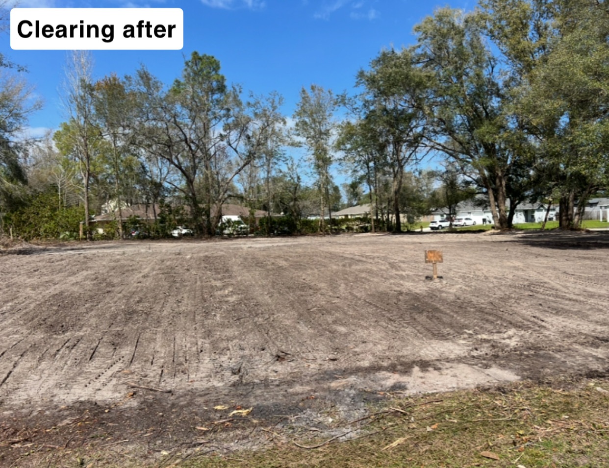 After land clearing — fully cleared and graded residential lot with mature trees preserved in Deltona, FL
